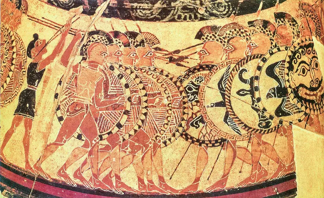 A painted frieze of armoured soldiers with round shields advancing, a piper among them.