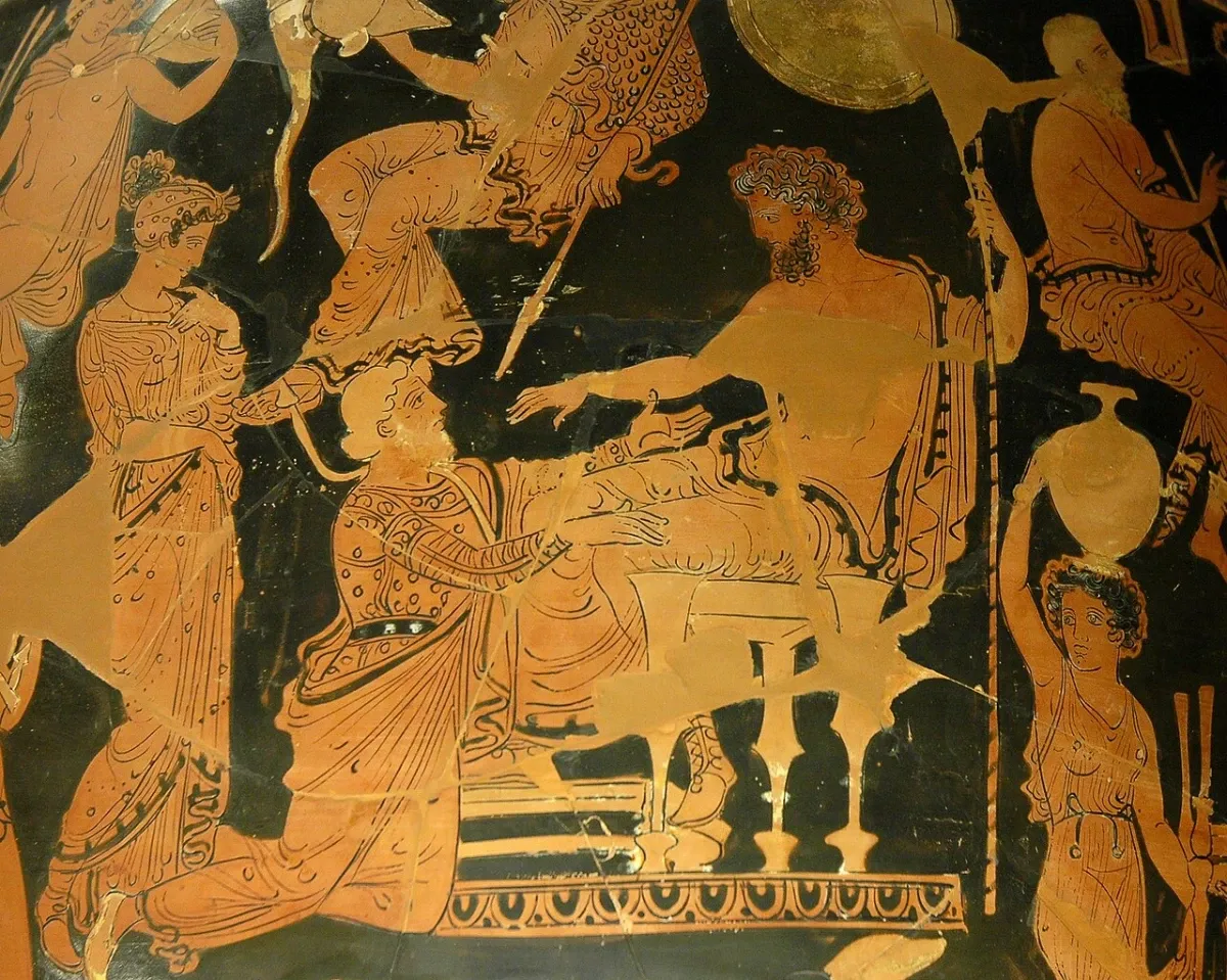 A king seated on a throne, an old man in a long robe approaching him, attendants around.