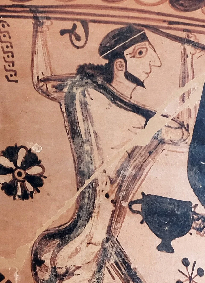 A detail of an early painted amphora: a man in white raising a long stake.
