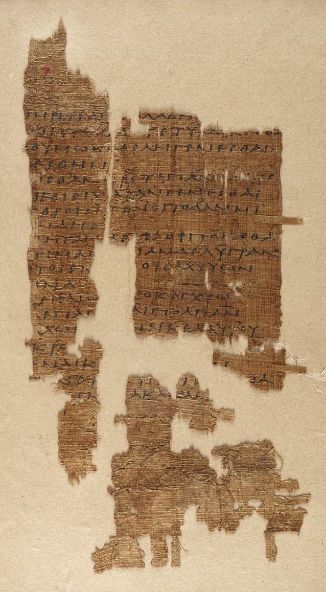 Tall papyrus fragment with a column of Greek text.